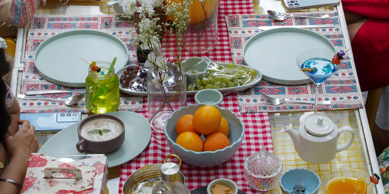 A charming table setup at Behind the yellowdoor diner, perfect for a picnic setting.