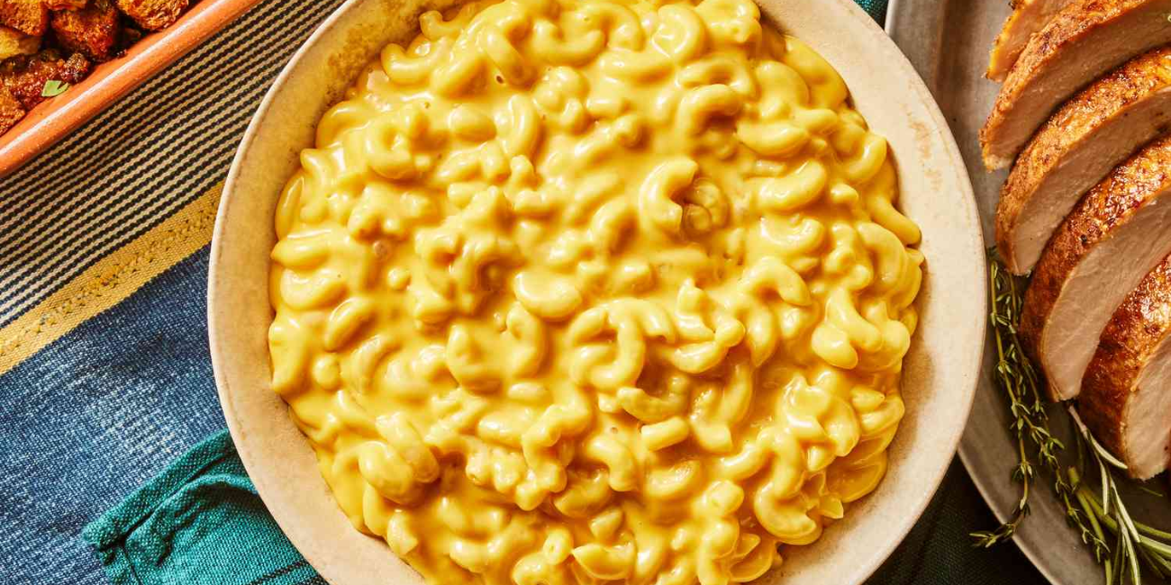 A bowl filled with creamy macaroni and cheese